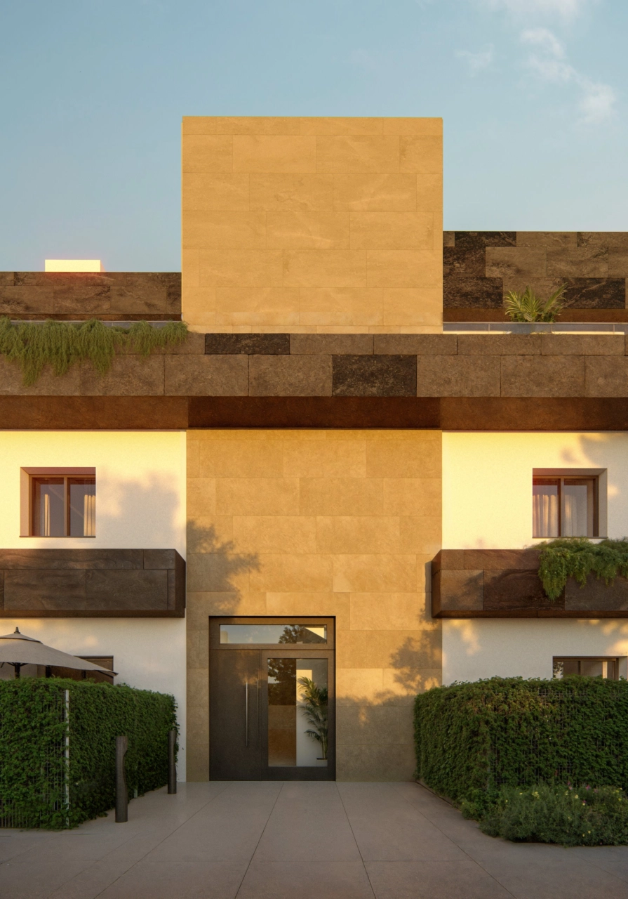 En detaljeret visning af den moderne arkitektur og hovedindgangen til ejendommene.