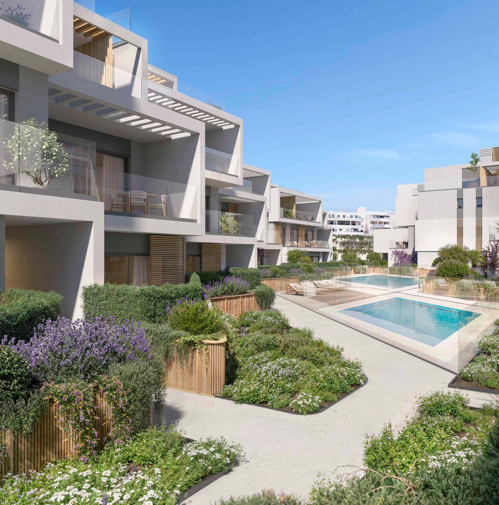 Smukt anlagte haver skaber et fredfyldt og naturligt miljø i hele bebyggelsen.