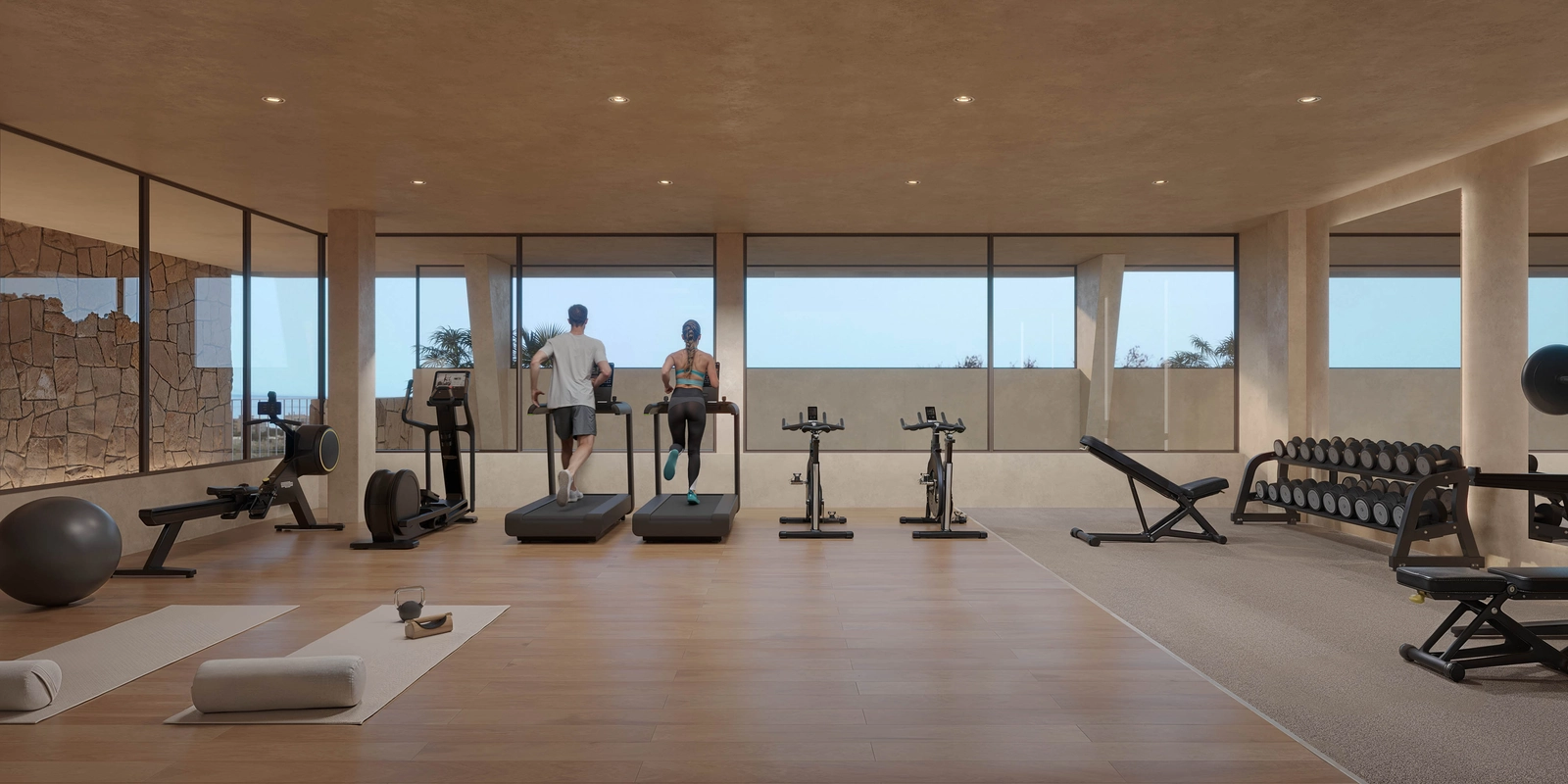 Et fuldt udstyret, topmoderne fitnesscenter for beboere.