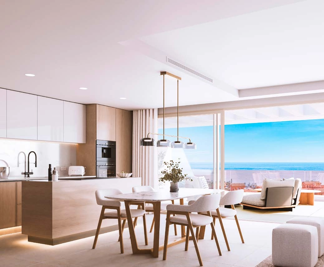Spacious living rooms connect to the terrace, bringing the stunning sea views inside.