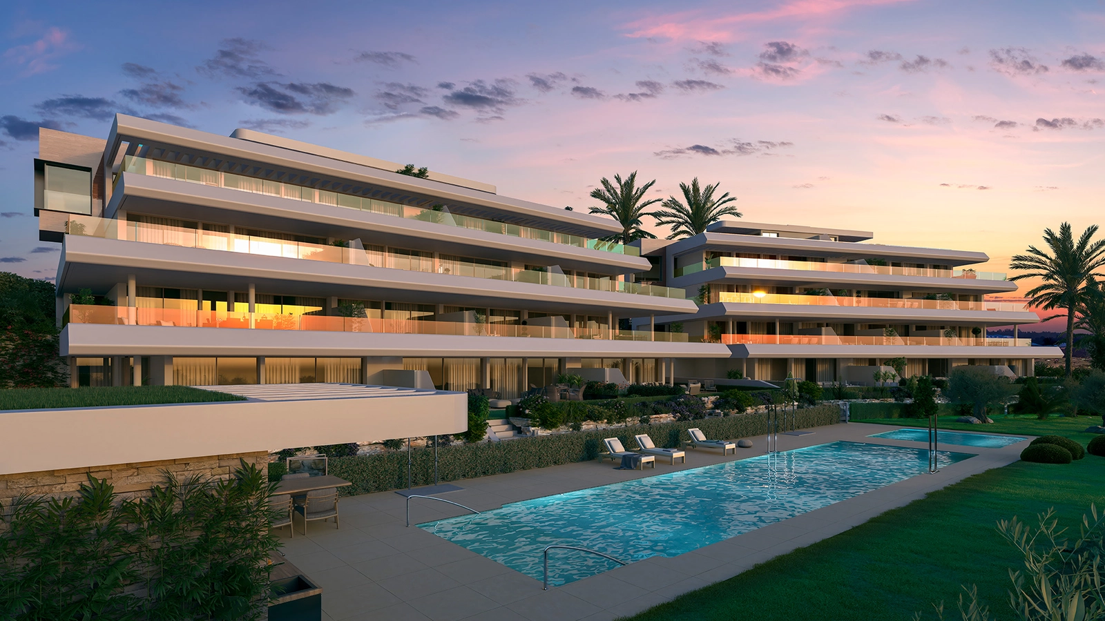 The communal swimming pool is a beautiful centerpiece for residents to enjoy the Costa del Sol sun.