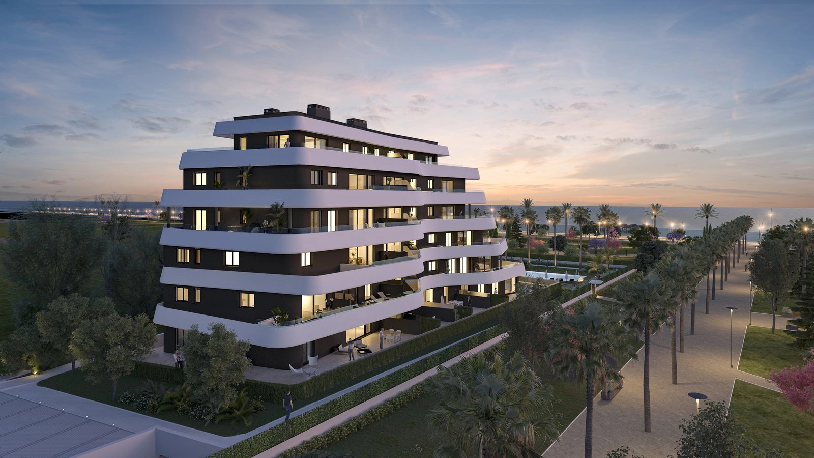 An evening view of the development, showcasing its modern architecture and proximity to the beautiful Torremolinos coastline.