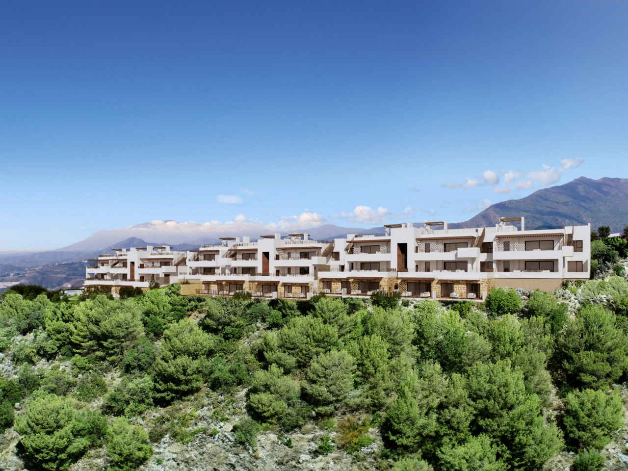 The elegant modern architecture of the residences, designed to blend with the natural landscape of the Costa del Sol.