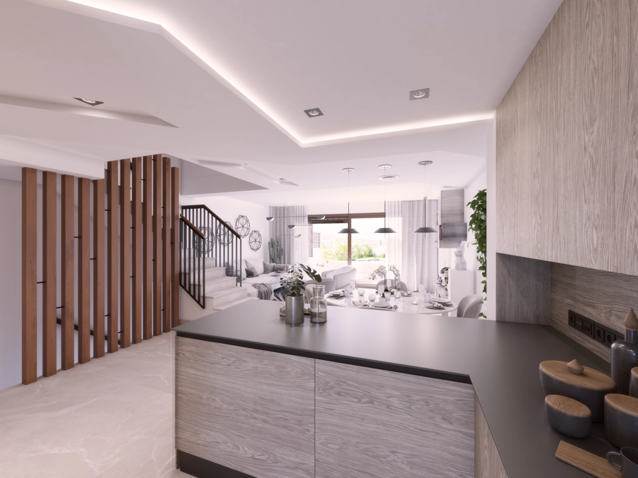 The modern kitchen is fully equipped and integrated into the open-plan living space.