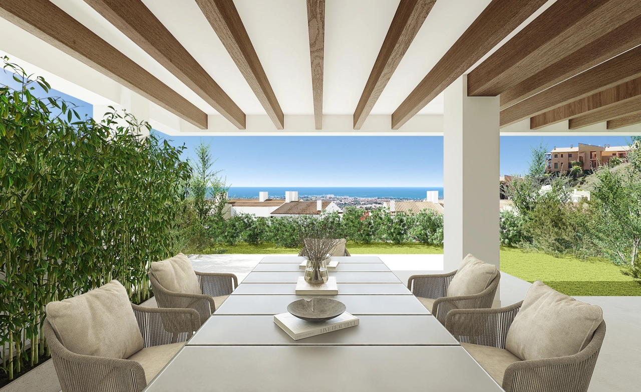 The expansive covered terrace offers a perfect setting for dining while enjoying the stunning sea views.