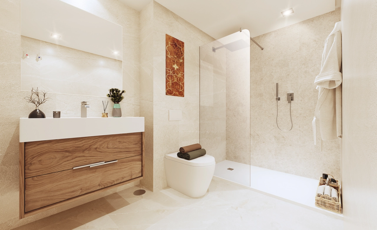 A stylish bathroom featuring a walk-in shower and contemporary fixtures in warm, natural tones.