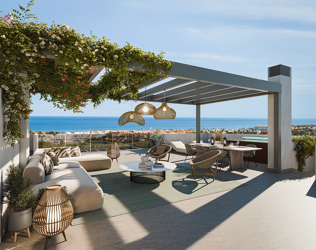 The expansive penthouse terrace offers panoramic sea views over the Costa del Sol, an ideal space for entertaining.