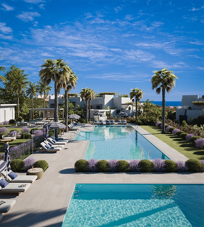 Relax by the pool and enjoy the warm Mediterranean sun in a beautifully landscaped setting.