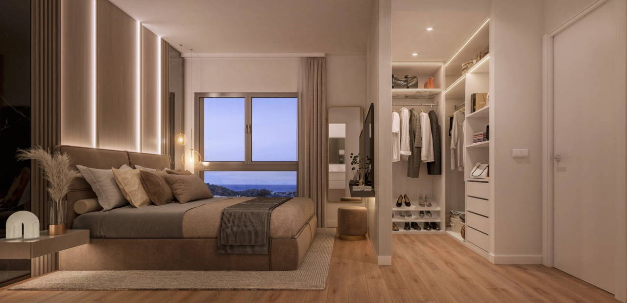 The master bedroom offers a peaceful retreat with serene sea views and a spacious walk-in wardrobe.