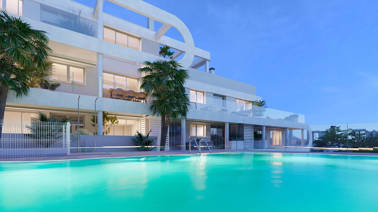 The communal swimming pool and sunbathing area, with views towards the Mediterranean Sea.