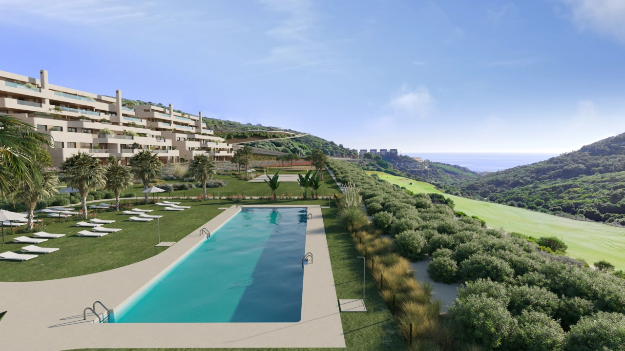 The communal pool area, a perfect retreat with stunning sea and golf course views.