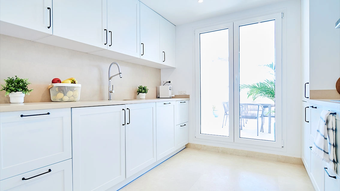 A modern, fully equipped kitchen with high-quality appliances and clean lines, making cooking a pleasure.