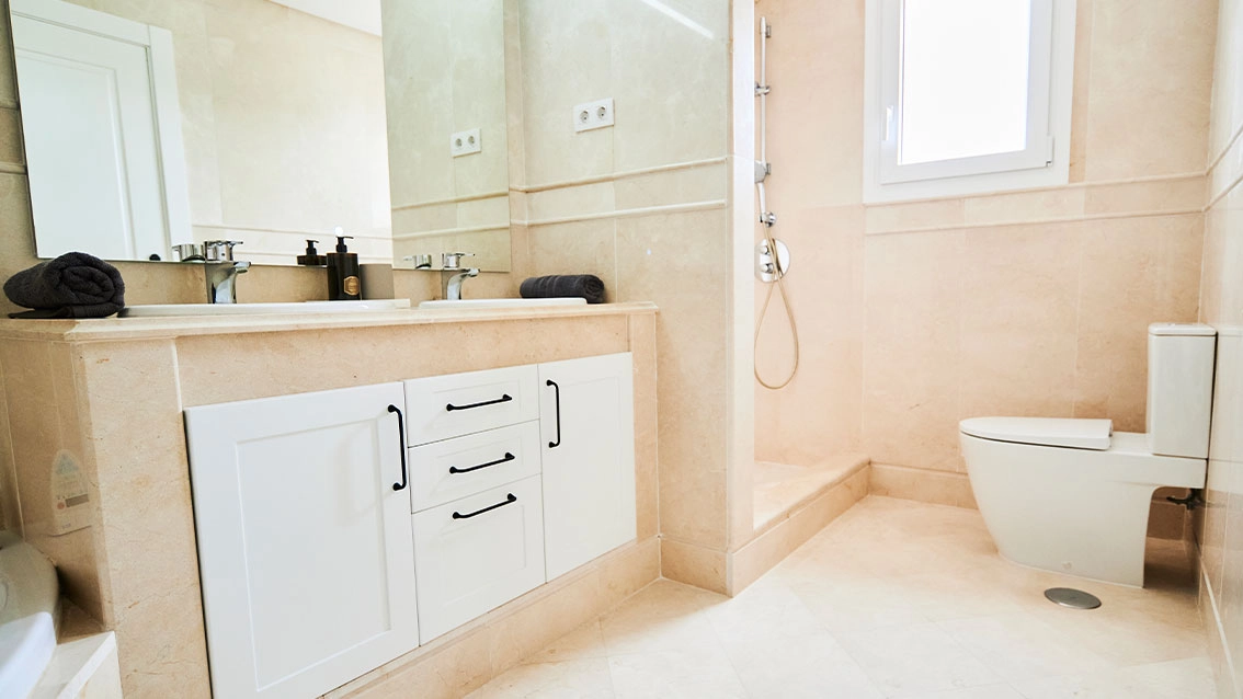 An elegant bathroom featuring high-quality materials and contemporary fittings for a spa-like experience at home.
