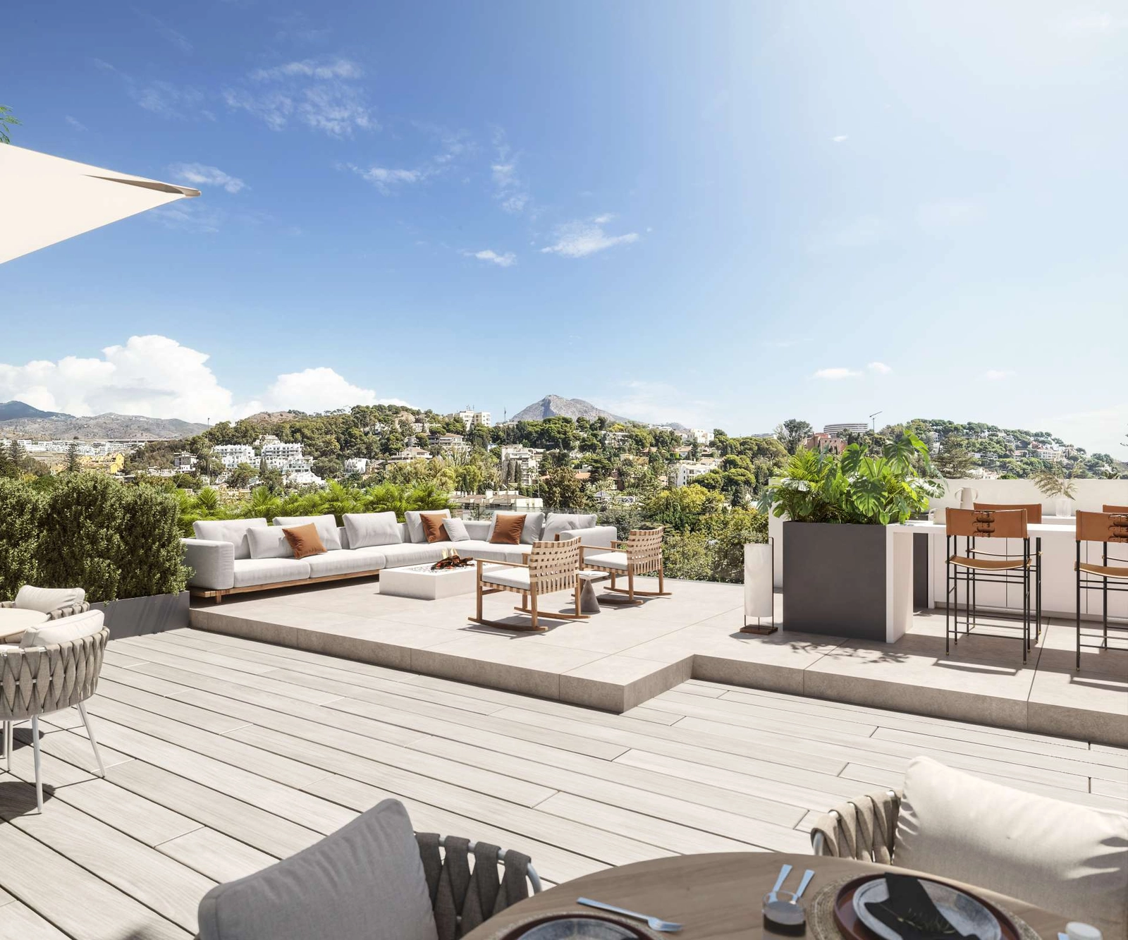 The rooftop terrace provides a perfect setting for relaxing or entertaining against the backdrop of the Costa del Sol.
