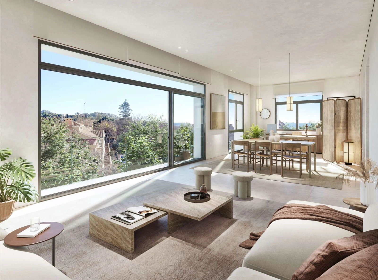 Large windows fill the living spaces with natural light and connect the interiors with the beautiful surroundings.