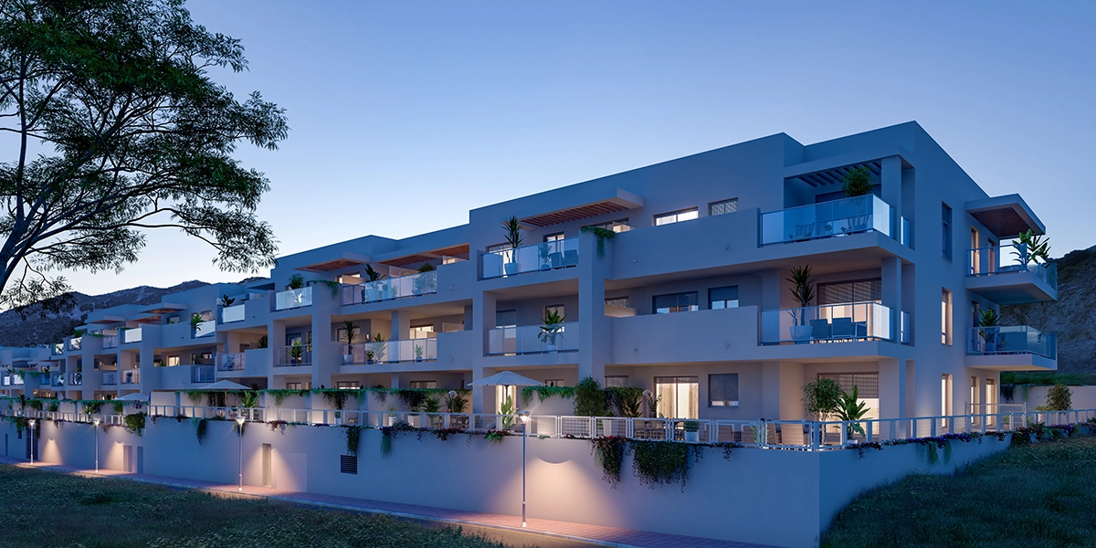 The elegant exterior of the residences as evening approaches.