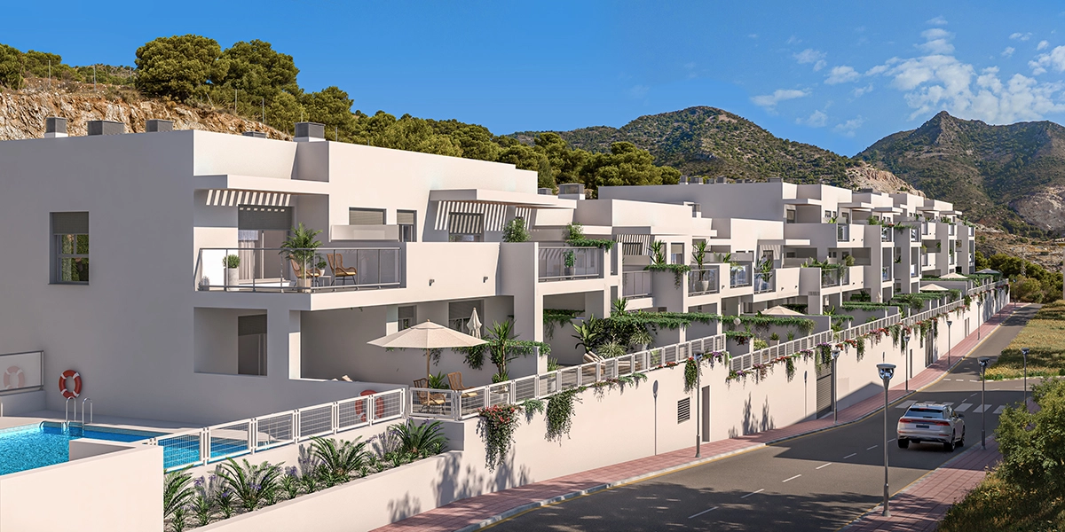 The modern architecture of the development, nestled in the hills of Benalmádena.