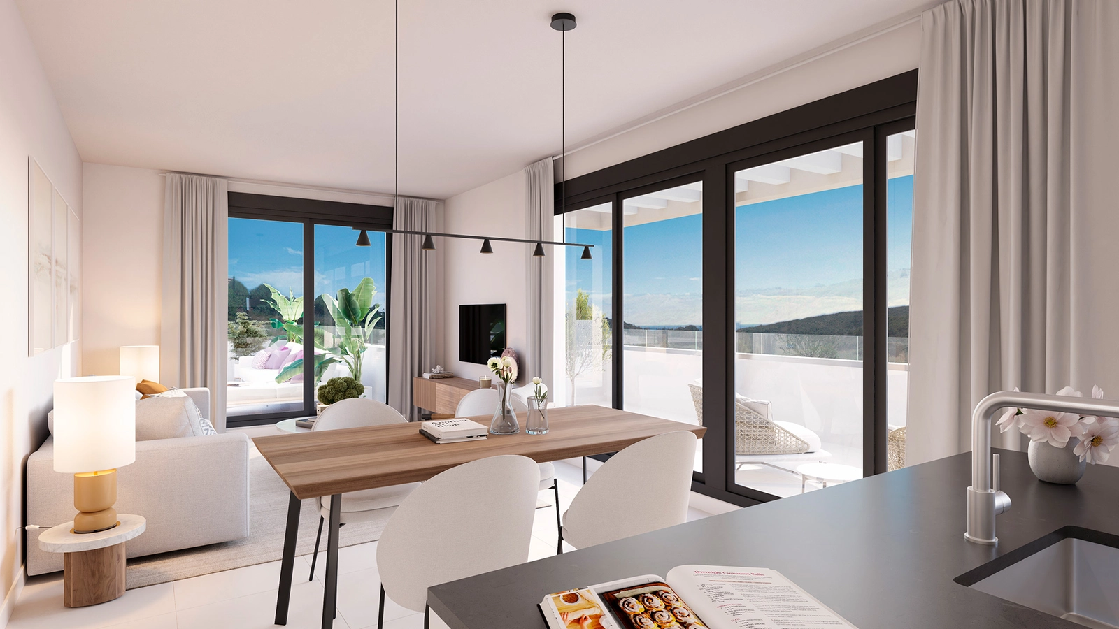 A stylish dining area connects the modern kitchen and comfortable living room, perfect for entertaining.