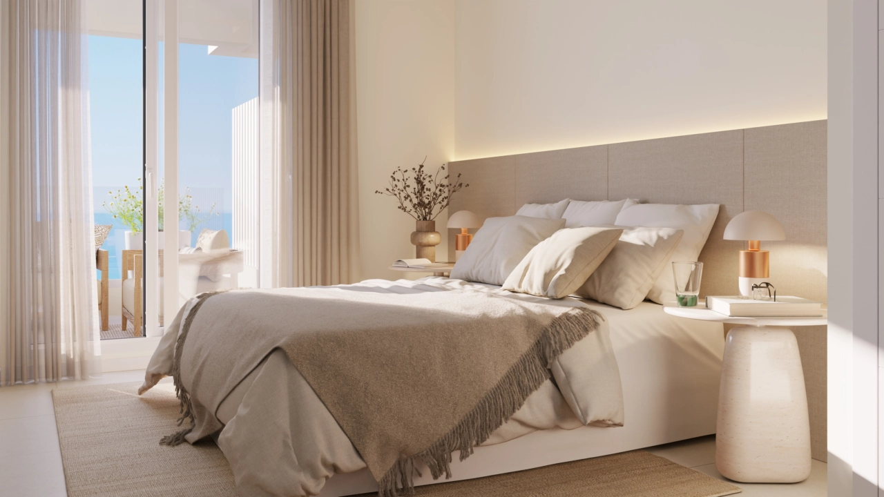 The master bedroom offers a serene retreat with direct access to the terrace.