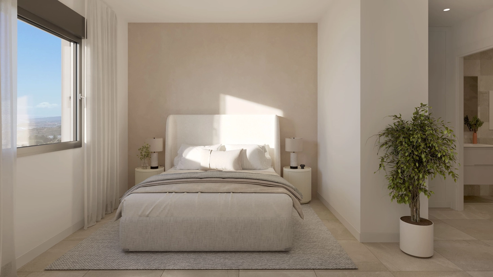 The principal bedroom offers a serene and restful space with ample natural light and a clean, contemporary design.