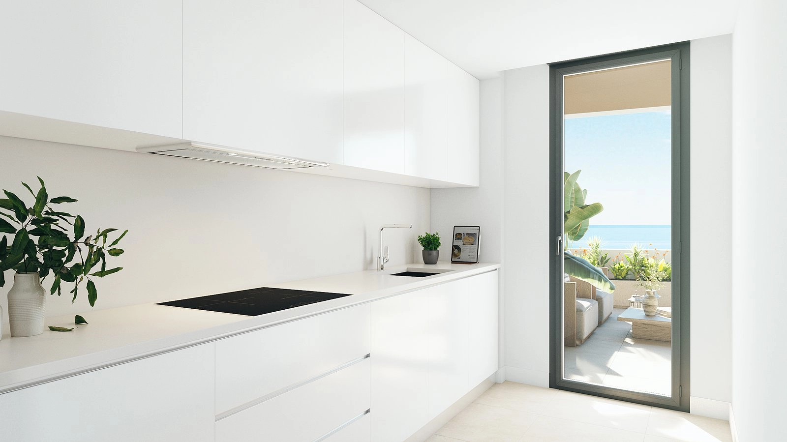 A bright, modern kitchen equipped with high-end appliances, opening onto the terrace for an indoor-outdoor lifestyle.