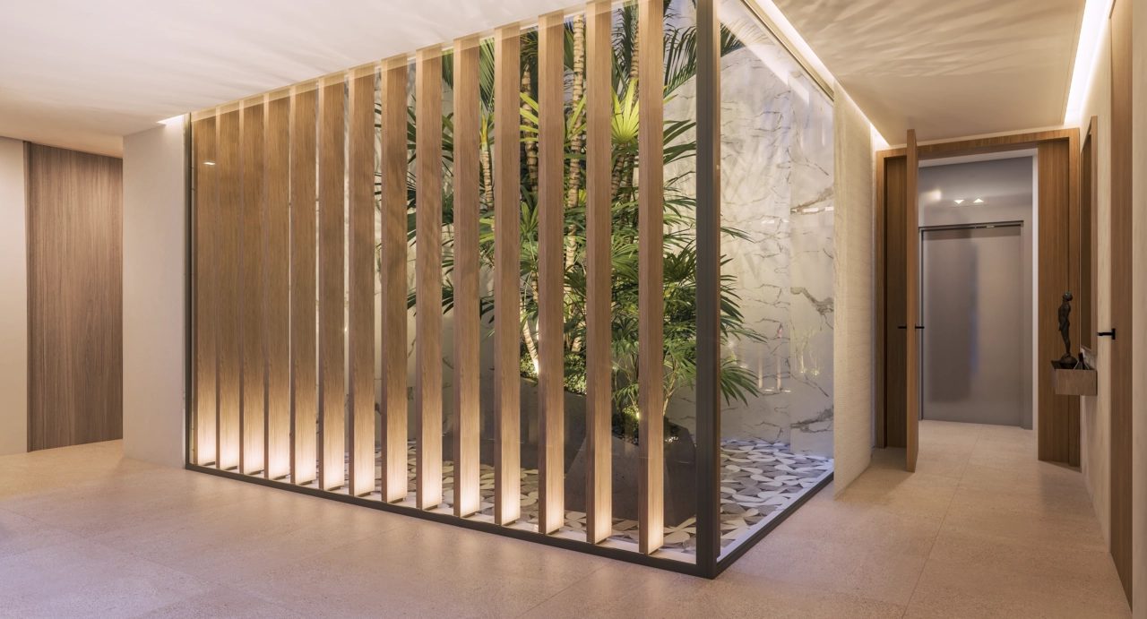 Common areas are designed with natural materials and light, creating a serene and inviting entrance.