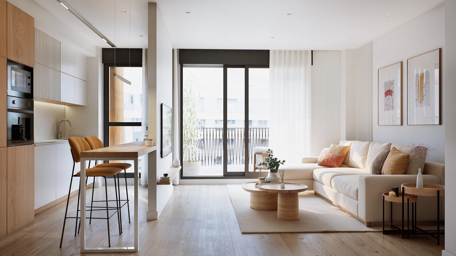 An open-plan living space where the modern kitchen, dining area, and lounge flow together, creating a sense of space and light.