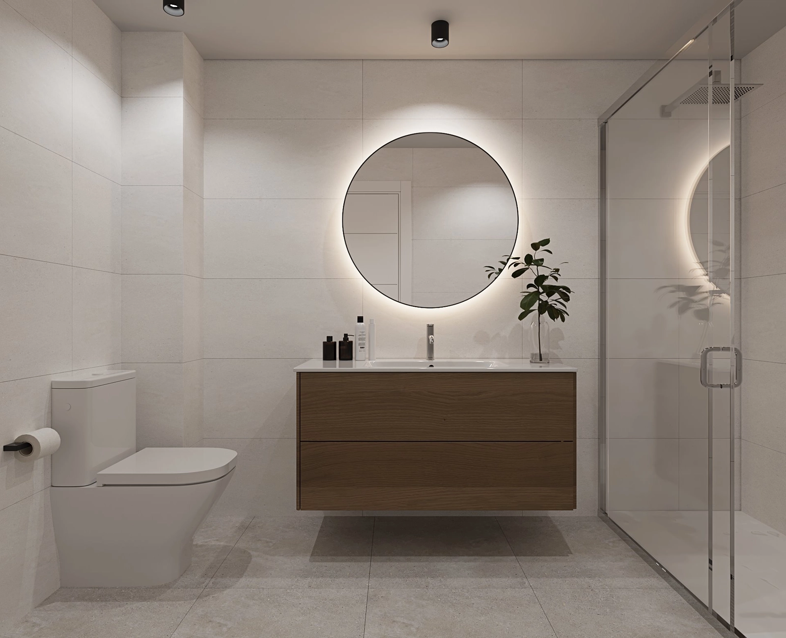 A sleek and modern bathroom featuring a walk-in shower and elegant finishes.