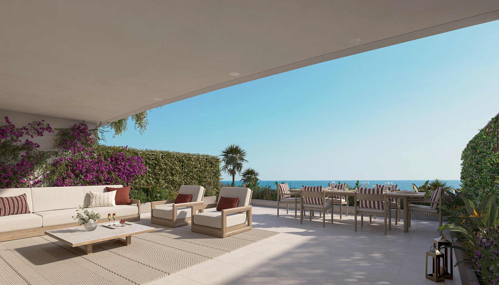 Enjoy outdoor dining and relaxation on your expansive private terrace with panoramic sea views.