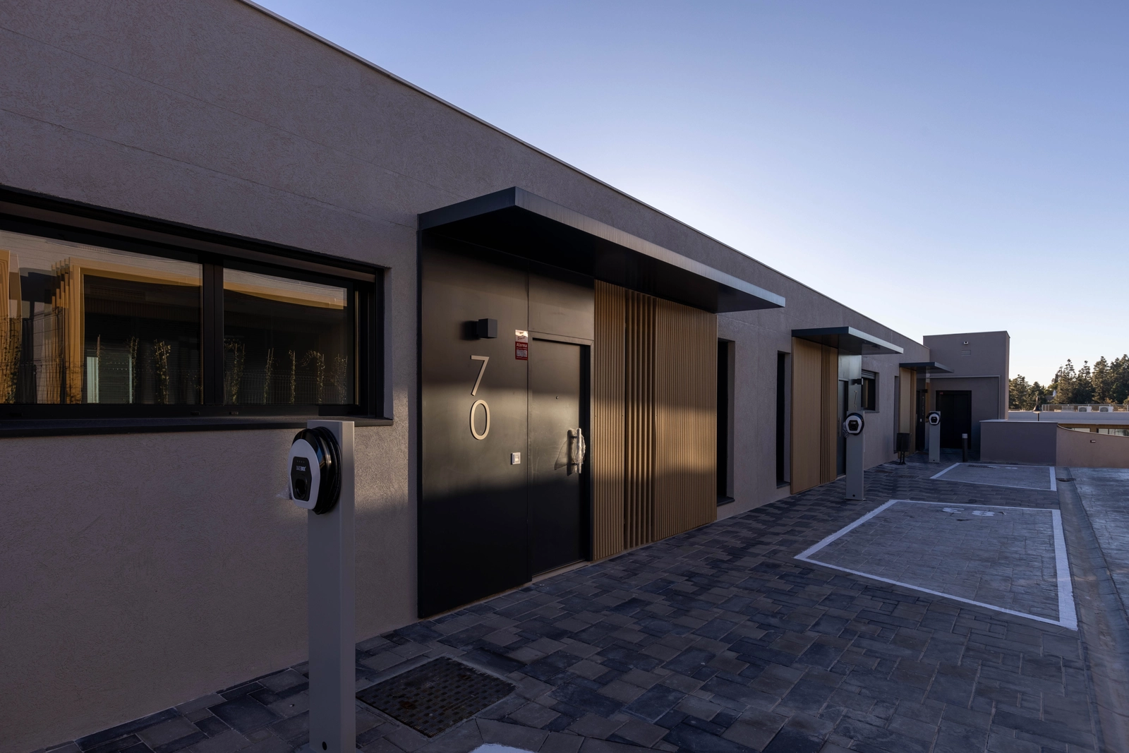 Private parking spaces include convenient charging points for electric vehicles.