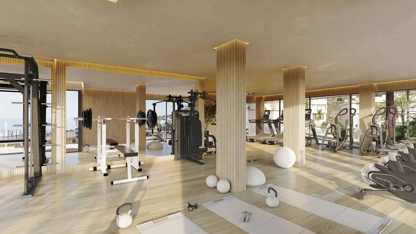 Gym with natural light and sea views, perfect for daily workouts.