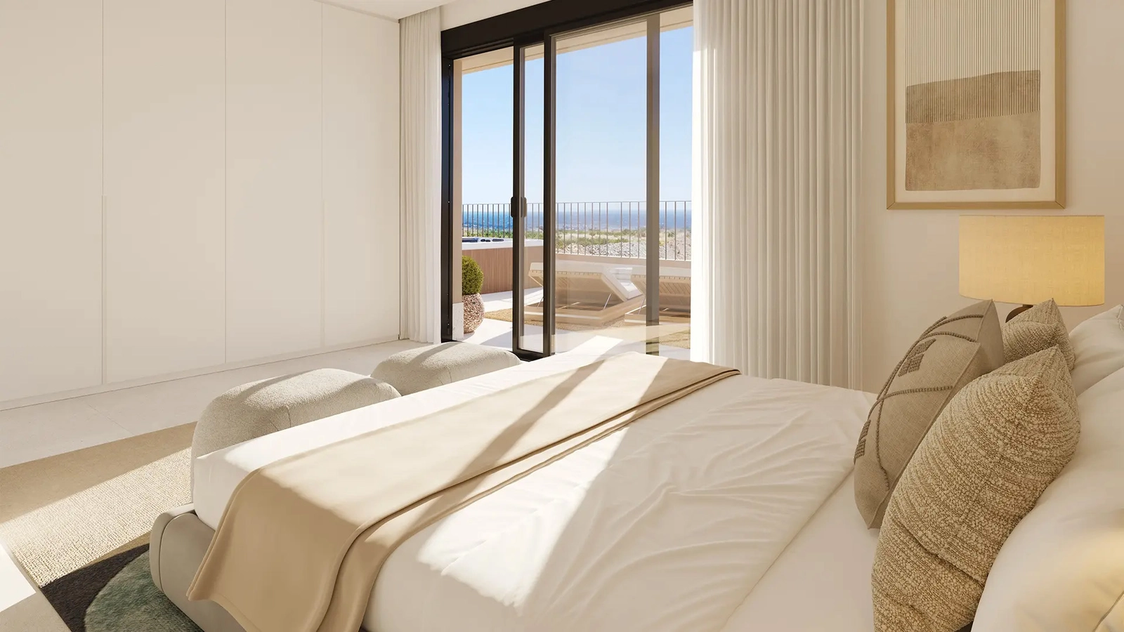 Master suite with soft light and sea views, a quiet space for rest and comfort.