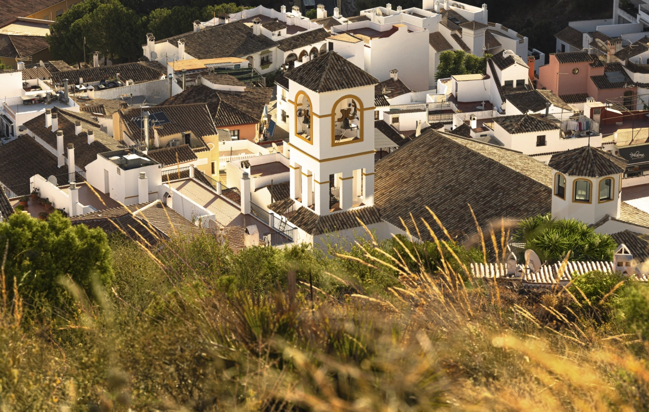 A view of the iconic church tower, capturing the authentic charm of Benahavís village.
