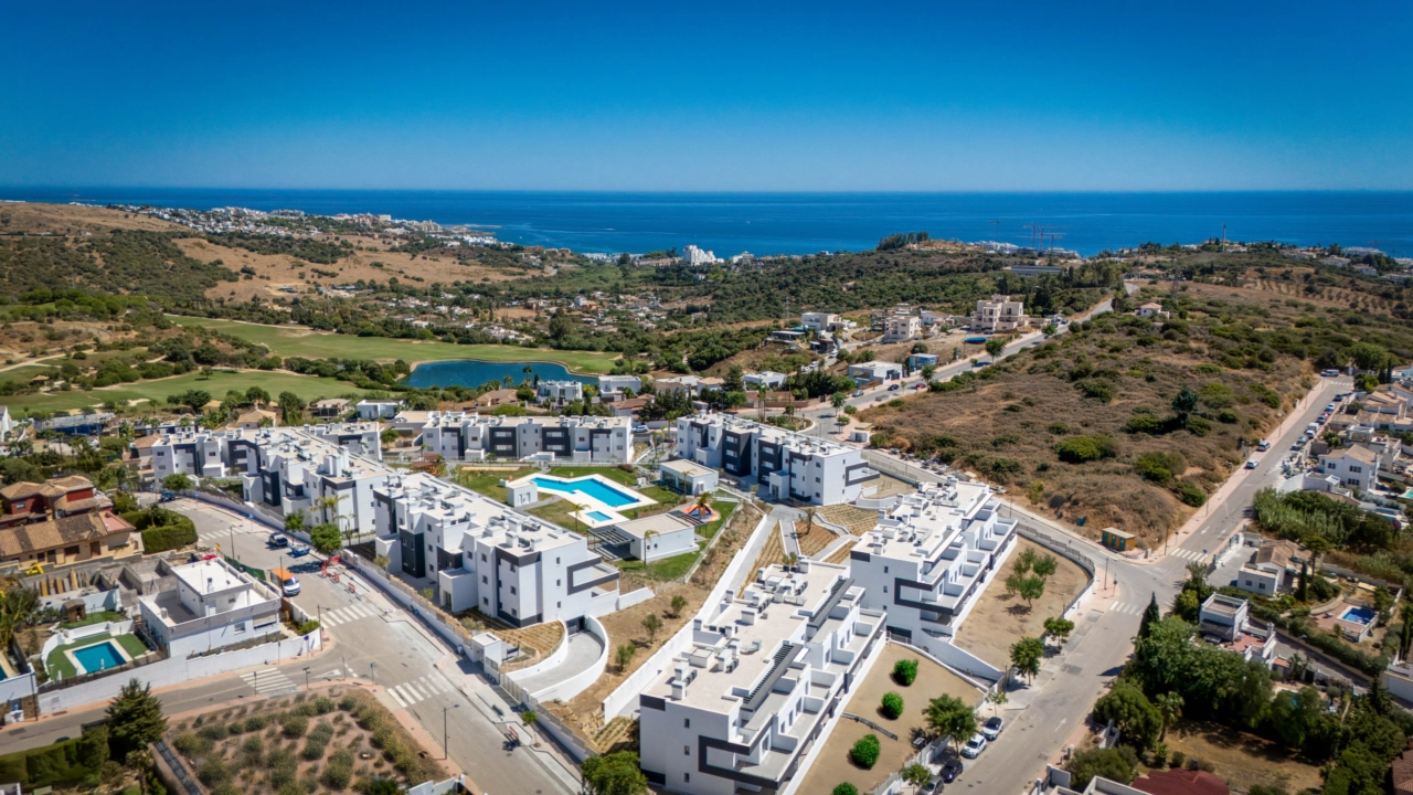 An aerial view of the development, perfectly positioned between the mountains and the Mediterranean Sea on the Costa del Sol.