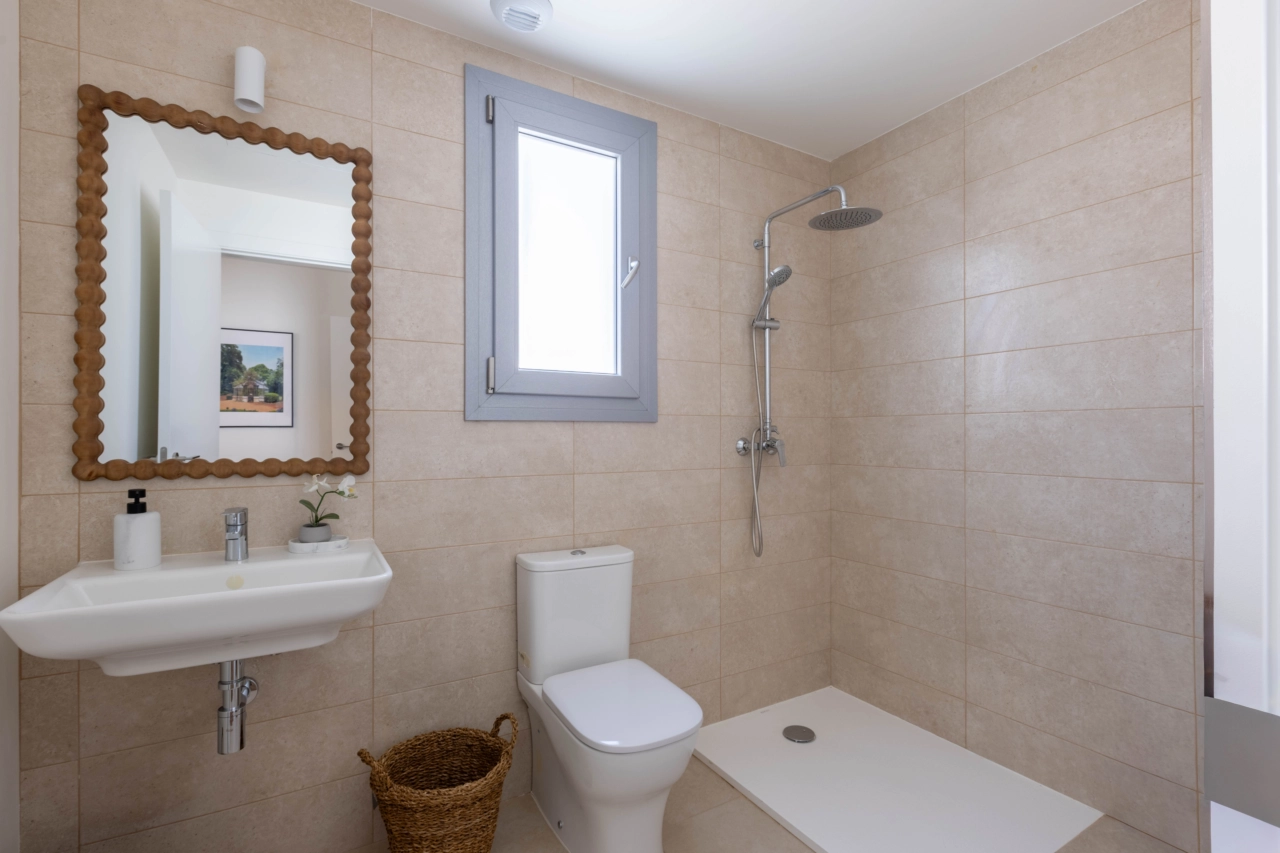 A stylish and functional bathroom with premium fixtures and a walk-in shower.