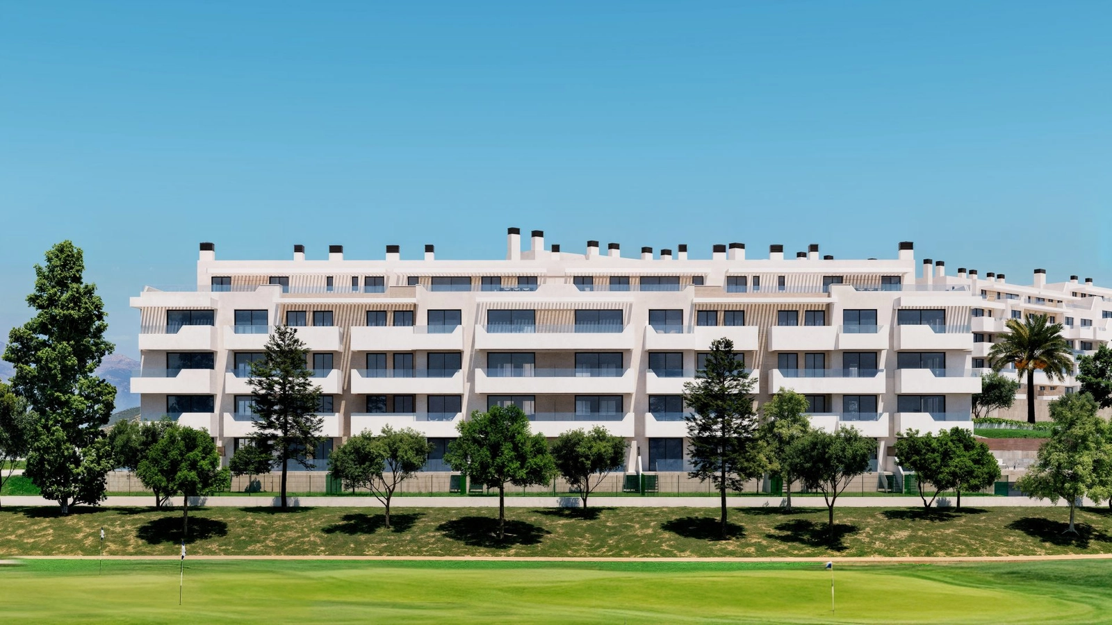 The modern architecture overlooks the lush fairways of the nearby golf course.