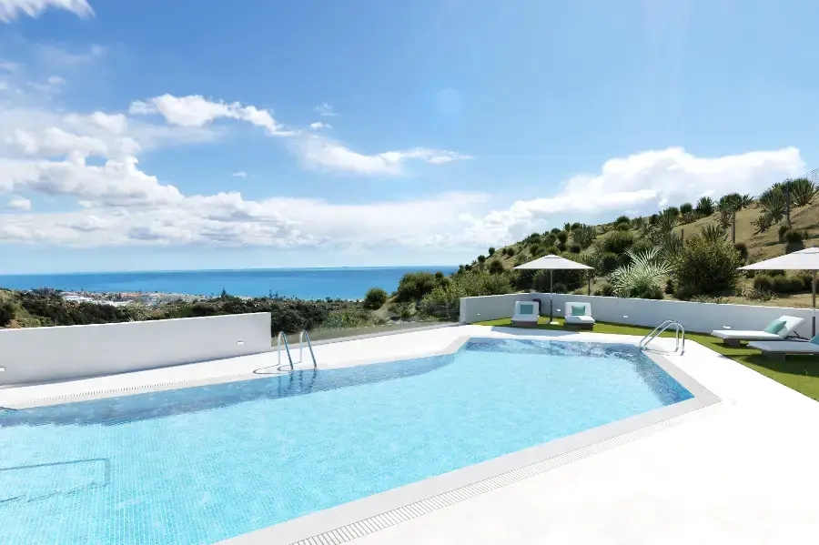 The communal pool offers a refreshing escape with beautiful sea views over the Costa del Sol.