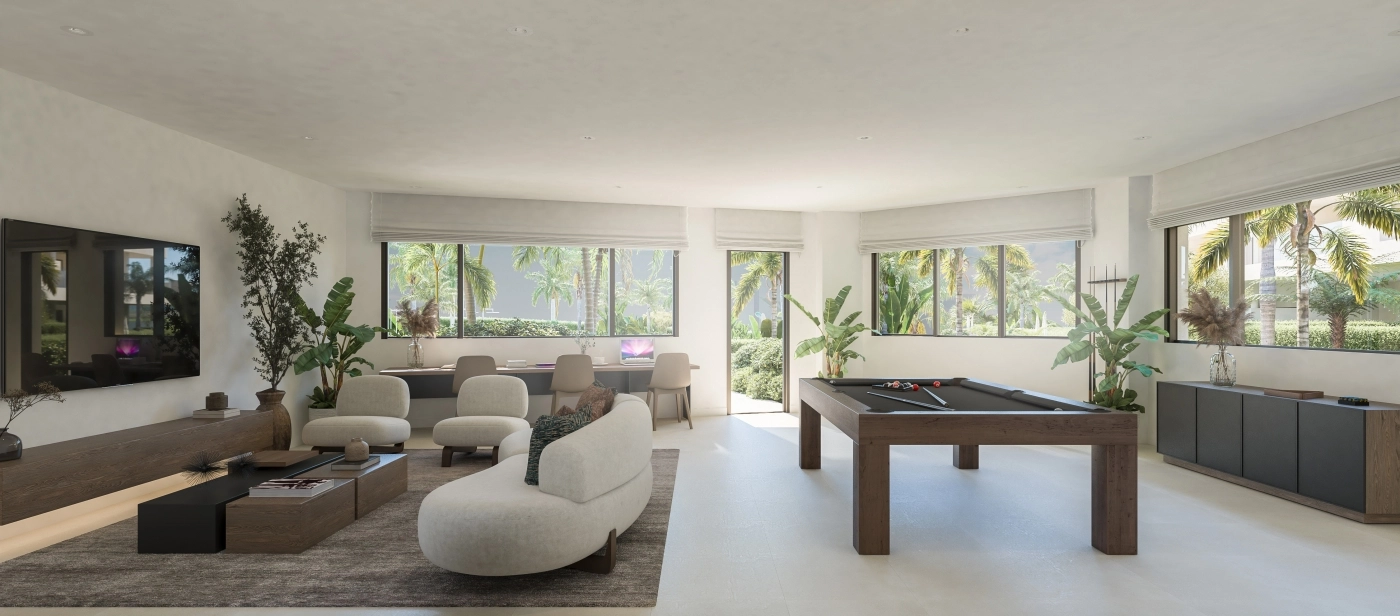 The communal social lounge, a versatile space for residents to work, meet, or relax in comfort.