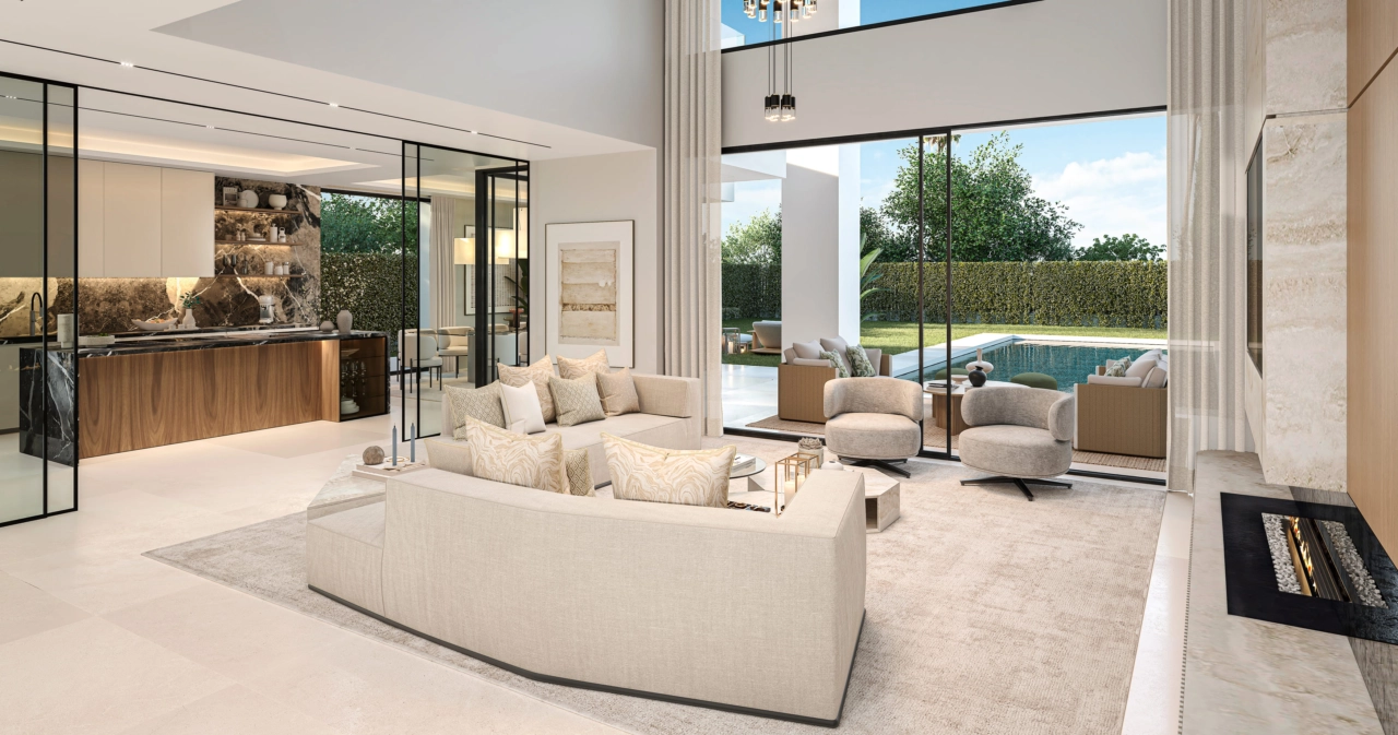 The open-plan living space connects seamlessly with the outdoor terrace, blending indoor comfort with the beauty of the outdoors.