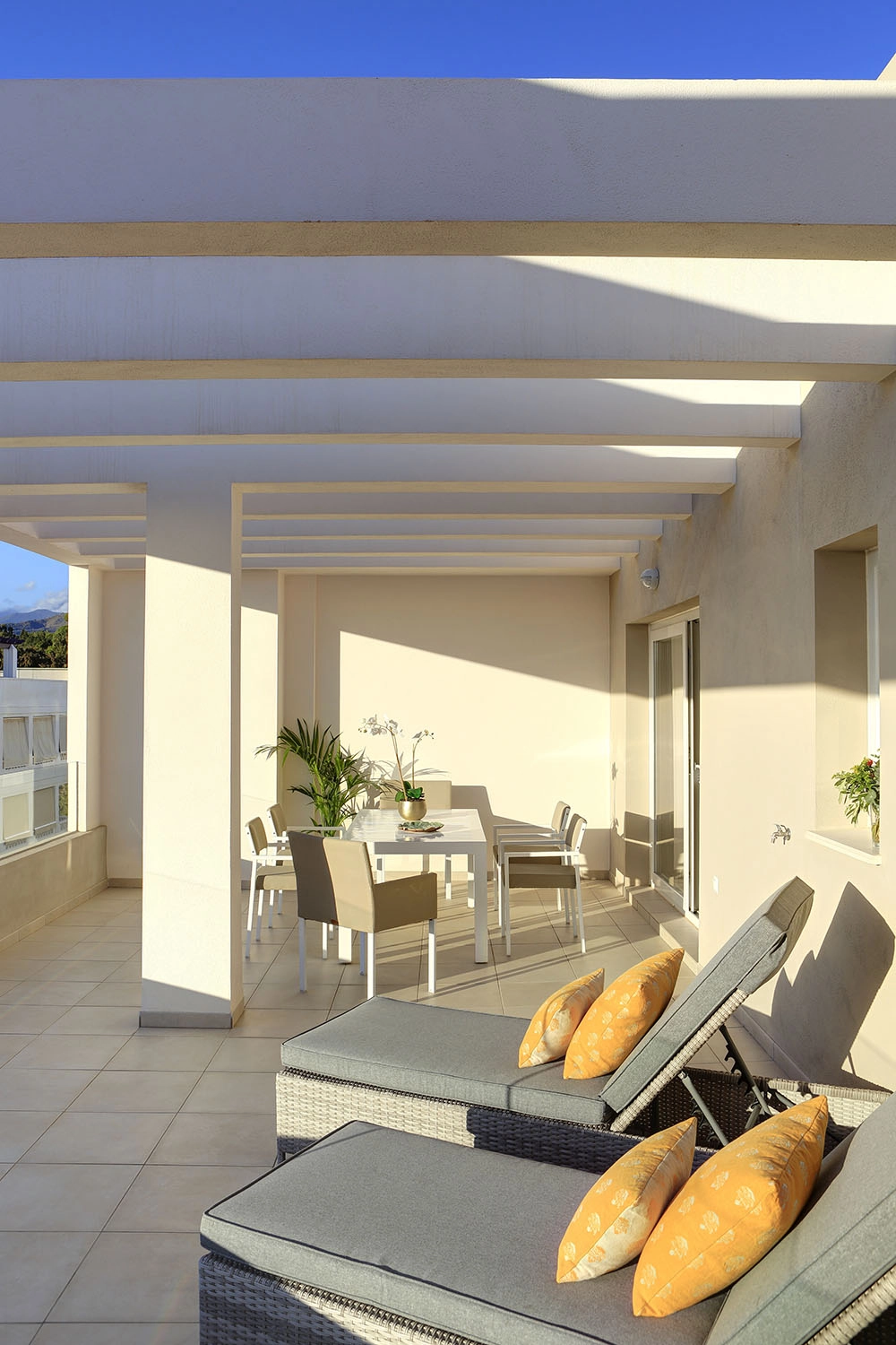 Soak up the Spanish sun on your private terrace, designed for ultimate relaxation and comfort.