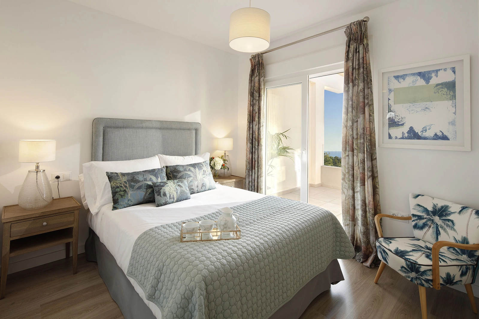 The master bedroom is a peaceful retreat, complete with direct access to a private balcony.