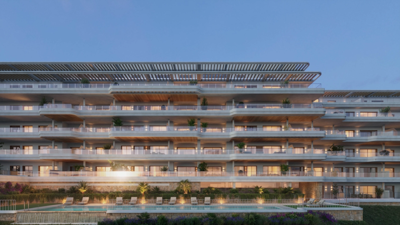 The building's elegant architecture illuminated at sunset.