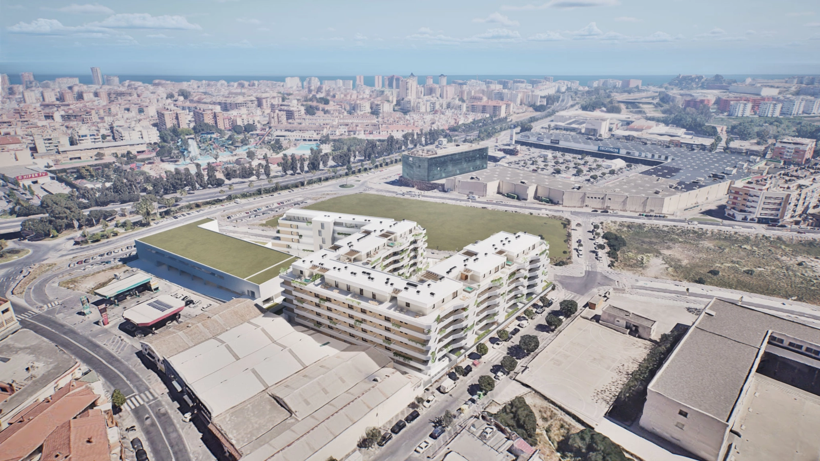 An aerial view showing the development's prime location, with the Mediterranean Sea in the distance.