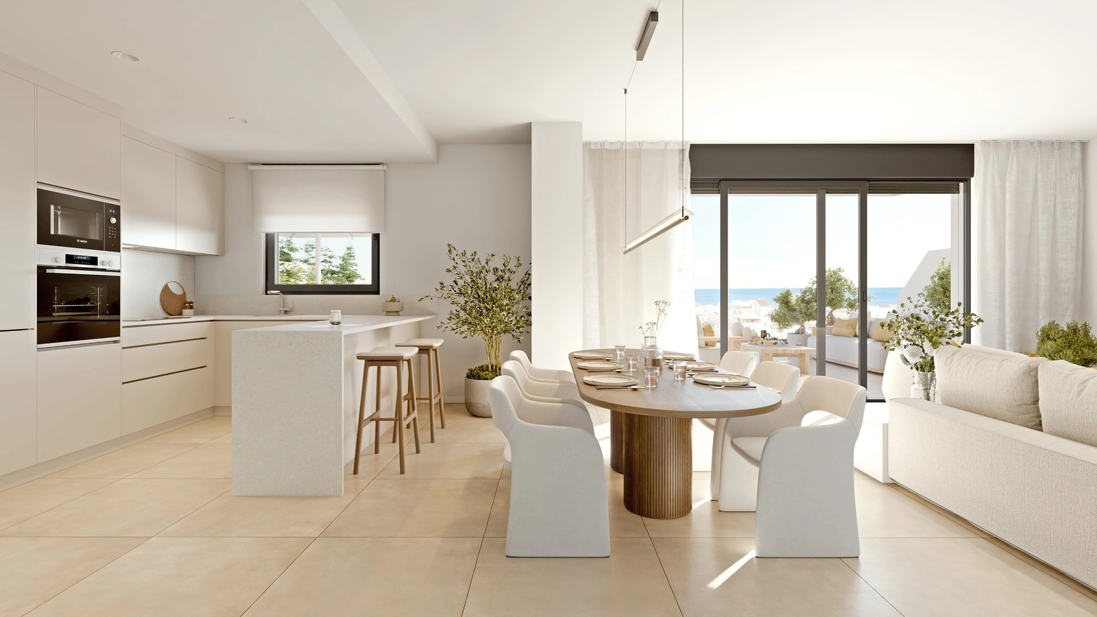 A modern, fully-equipped kitchen flows into the dining area, creating a perfect space for entertaining.