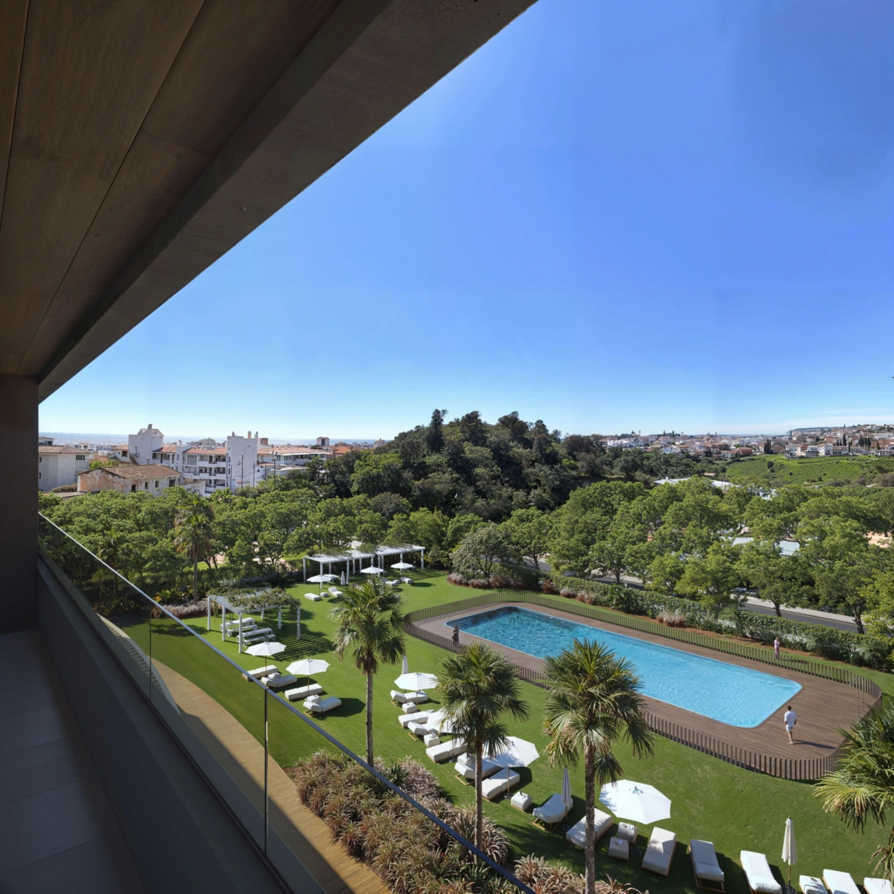 Enjoy beautiful views over the lush gardens and swimming pool from your own balcony.