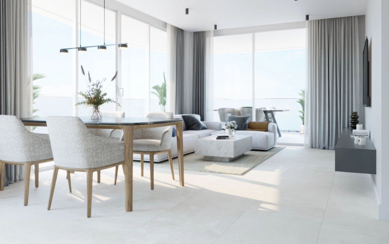 A spacious and bright living and dining room, designed for comfort and elegance.