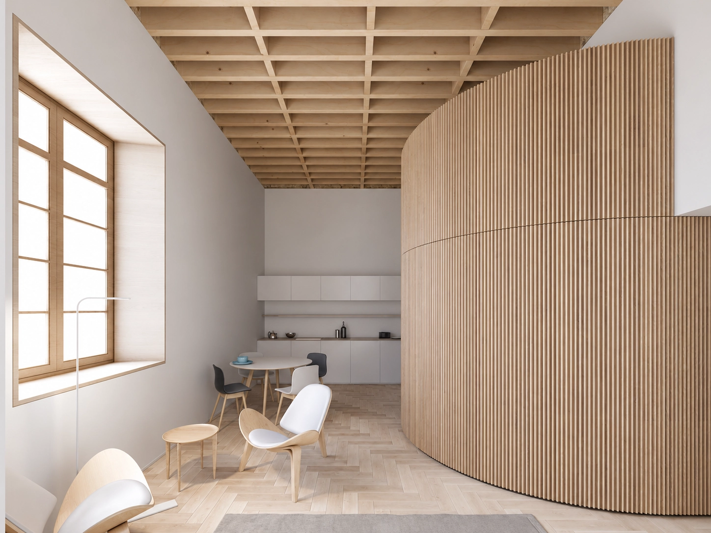 A view of the seamless integration between the kitchen and dining areas, featuring clean design and natural wood.