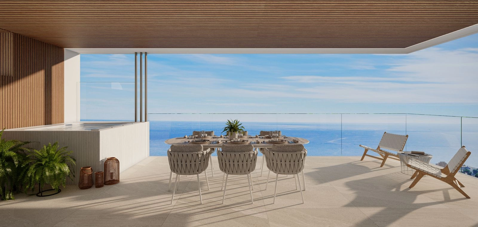 A spacious private terrace with a jacuzzi, offering magnificent sea views over the Costa del Sol.