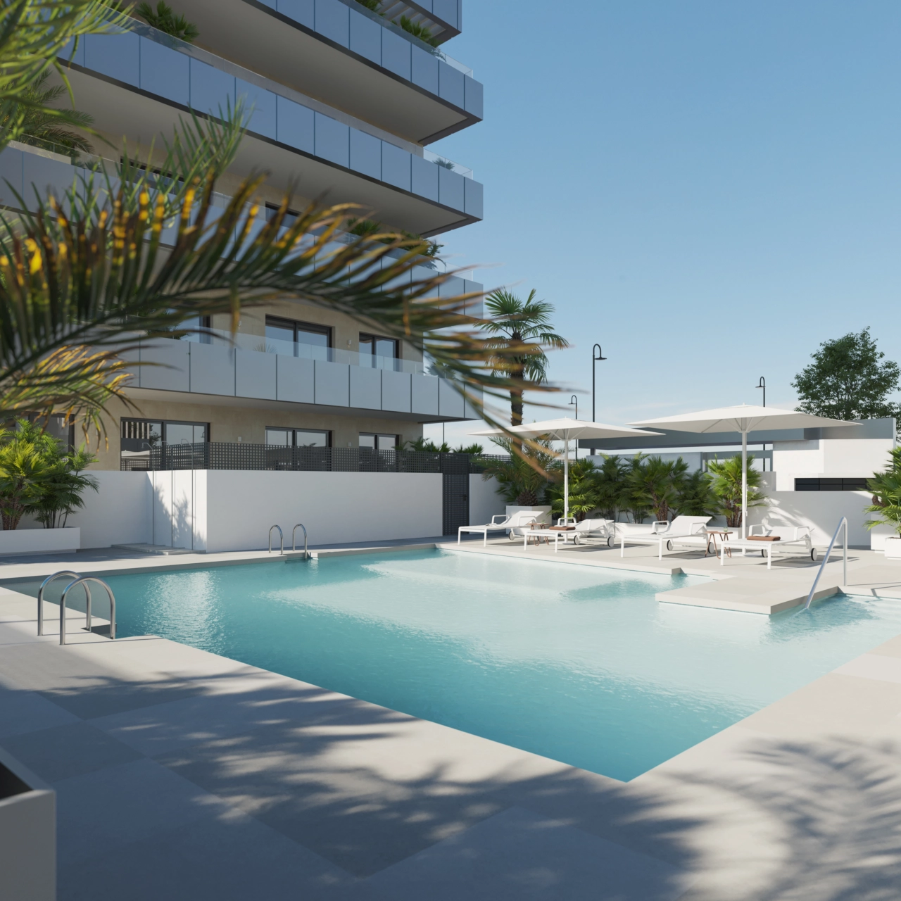 The outdoor communal pool is a perfect place to relax and enjoy the Spanish sun.