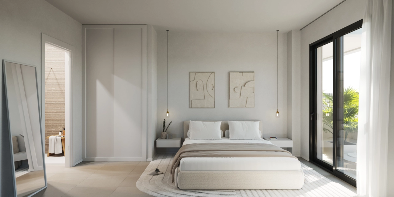 The master bedroom offers a tranquil retreat with direct access to the terrace.